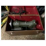 vintage sewing machine in case