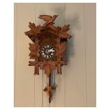 Two cuckoo clocks