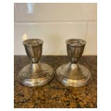 Sterling candle sticks.