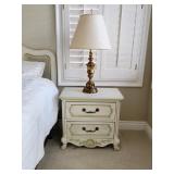 Victorian nightstand with vintage brass lamp