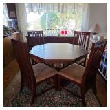 Mid century modern dining table and contemporary dining chairs