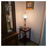 Vintage table with antique lamp