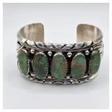 Vintage Native American sterling silver and turquoise Tom Taylor cuff bracelet
