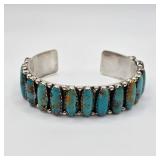 Vintage Native American sterling silver and turquoise Julia and H. Etsitty cuff bracelet