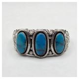 Vintage Native American sterling silver and turquoise Toby Henderson cuff bracelet