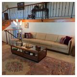 Mid century sofa, coffee table, and mid century modern lamps