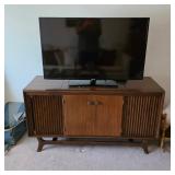 Mid century modern cabinet and Samsung TV