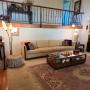 Mid century sofa, coffee table, and mid century modern lamps