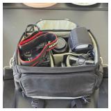 Canon EOS 50D digital camera with additional lenses and accessories