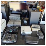 Samsung flat screen TV, Samsung Q70T soundbar with subwoofer