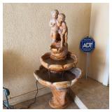 Stone two-tier cherub water fountain