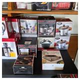 Kitchen items, cookware, and serving pieces