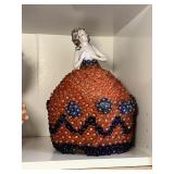 Glass skirt doll