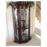 Rounded Curio Cabinet w/ Beveled Glass. (retired Lladros inside)