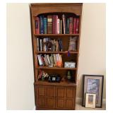Various vintage books and furniture