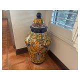 Vibrant Talavera-style ceramic jar with