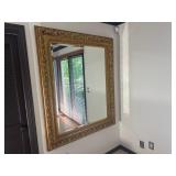 Oversized wall mirror in a baroque-style