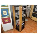 Wooden media tower filled with assorted