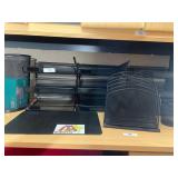 Set of black metal mesh desk organizers.