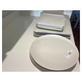 12 pcs of off white modern plates