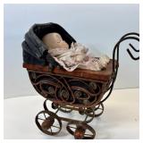 antique doll and buggy
