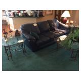 Green sofa.    Glass tables