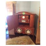 Chest on chest with door open to show pigeon hole drawers