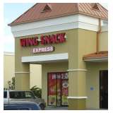 driveway between wing shack and O