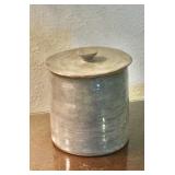 Covered pottery container