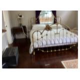 Large brass bed
