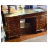 Nice inlayed desk has casters