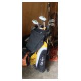 Lots of golf clubs and bags