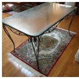 Antique iron table and Silk area rug