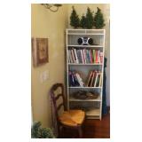 Wicker shelf full of books