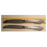 Detail of sterling handled Grand Baroque dinner knives