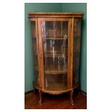 China cabinet with curved glass front