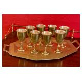 Brass goblets on tray