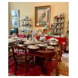 Dining table covered with old family silver plate hollow ware