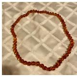 Amber?  Necklace hand tied beads