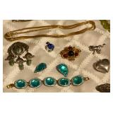 Pins, bracelets, earrings, necklaces