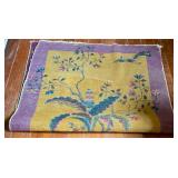 Back of purple carpet in bedroom