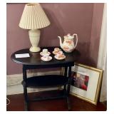 Oval table, lamp, tea set