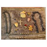 Pins and necklaces