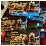 Model train pieces and boxes