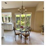 round glass top dining set, faux plants