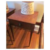 Several antique work tables