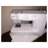 Kenmore sewing machine with case