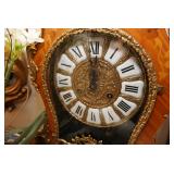 Italian made ornate clock with inhale wood and brass accents
