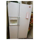 White GE side by side refrigerator
