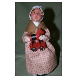 Dept 56 Williamsburg Caroling Girl